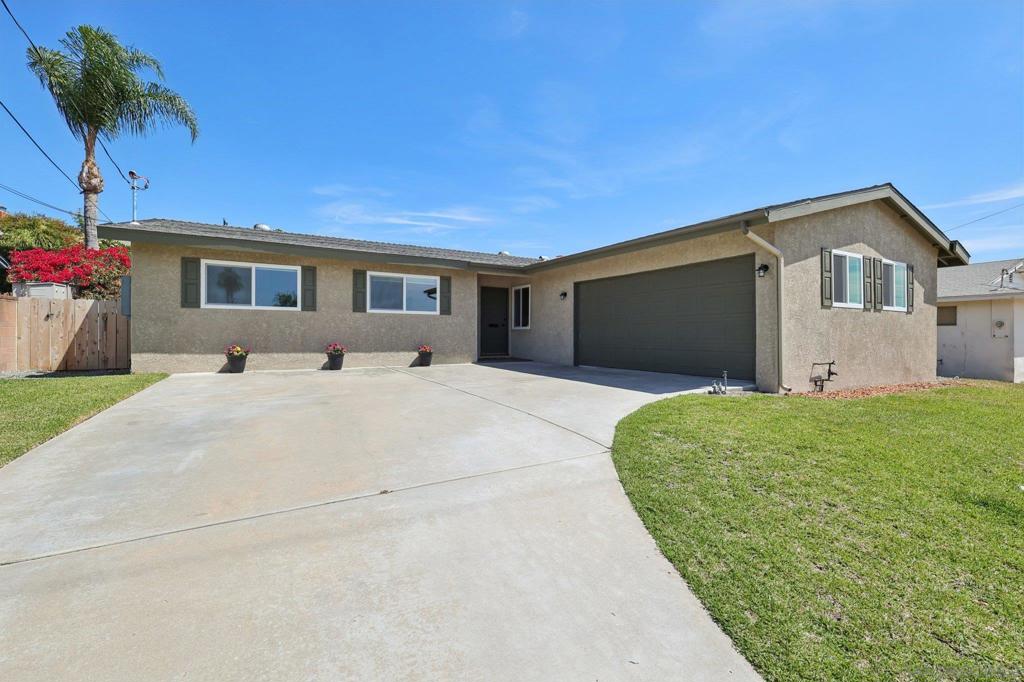 PRIME SAN CARLOS LOCATION * BEAUTIFULLY REMODELED 3 BEDROOM & 2 BATHROOM SINGLE STORY HOME * WALKING DISTANCE TO PERSHING MIDDLE SCHOOL AND COWLES MOUNTAIN Welcome to 8374 Lake Gaby Avenue, your beautifully upgraded 3-bedroom, 2-bathroom home in the heart of San Carlos, one of San Diego’s most sought-after neighborhoods. Just a short walk to Pershing Middle School, the trails of Cowles Mountain, San Carlos Recreation Center, and the San Carlos Community Garden, this move-in-ready home offers comfort, convenience, and style in a prime location. Step inside to a bright and welcoming single-level layout featuring Tutor Oak luxury vinyl flooring throughout, custom 2-tone interior paint, and abundant natural light. The kitchen showcases beautiful maple latte cabinets, quartz countertops, recessed lighting, and brand-new stainless steel appliances (except for the stove, which is one year old)—ideal for both everyday living and entertaining guests. The spacious living room showcases a stunning brick fireplace and flows seamlessly to the private backyard. Throughout the home, most hardware and fixtures have been updated to a rich matte black finish, which adds a touch of high-end designer style. The master bathroom has been fully remodeled with a custom-tiled step-in shower and a sleek, high-end glass sliding door. The guest bathroom is fully remodeled as well, with a new bathtub, modern vanity, and stylish fixtures. Central heating and air conditioning keep the home comfortable year-round. Additional upgrades include new windows, new exterior stucco, new gutters, and a new 220 electrical panel. The attached two-car garage offers plenty of custom-built-in storage cabinets and a dedicated workbench. The backyard is private and expansive with a large covered patio, perfect for entertaining or relaxing. There is also plenty of room for gardening and fruit trees. A termite clearance is already on file, providing peace of mind for buyers. Located minutes from Mission Trails Regional Park, Lake Murray, Mission Trails Golf Course, and some of the area’s best hiking, shopping, and dining, this home also offers easy access to the 125, 8, 15, and 52 freeways. Whether you're commuting downtown or heading to the beach, you're perfectly positioned to enjoy all that San Diego has to offer. Conveys: washer and dryer in garage (they are not new, purchase date unknown).