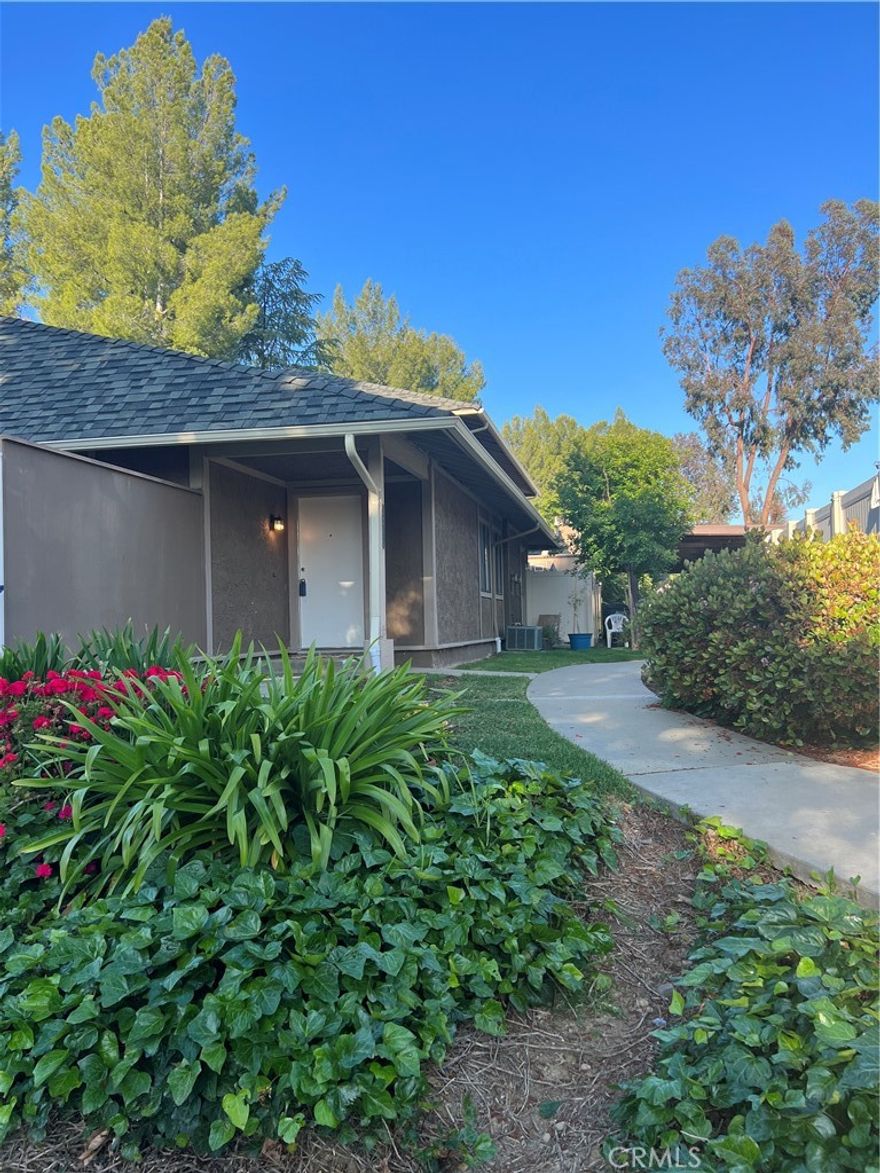 This charming Agoura Hills 3 bedroom 2 bathroom townhome features clean, light and bright interior with concrete flooring, stone detailing, recessed lighting, and ceiling fans. Surrounded by beautiful grounds that are maintained impeccably with manicured grass and mature trees. A fresh white kitchen with a breakfast bar and clean appliances. 1 covered car port and plenty of street parking. This community also offers a large pool and clubhouse to reserve for events. The home is located walking distance from Chumash park, the award winning Agoura High School, and in close proximity to other near by Las Virgenes schools. Also walking distance from supermarkets, restaurants, and other retail establishments. Owner pays $500 HOA fees which include water.