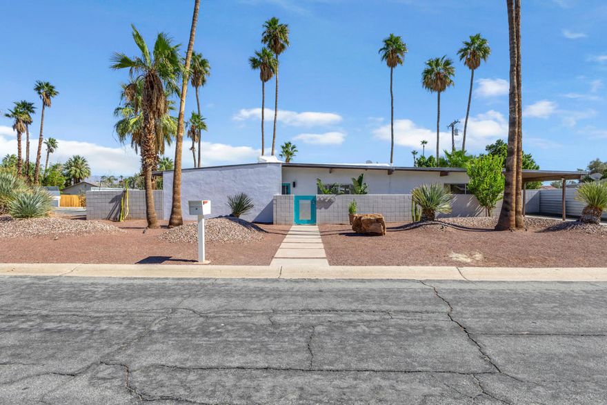 Welcome to 2250 E. Acacia Rd, an updated example of Desert Modernism, designed by Jack Meiselman. This serene Desert Park Estates home sits on a spacious corner lot allowing for breathtaking views of three mountain ranges. Step inside the low-slung home to discover signature details like an elegant floorplan, post-and-beam construction and butterfly roofs. The front of the home and living room with its high ceilings open to reveal the San Jacinto Mountains. The west-facing kitchen and dining areas overlook an expansive yard with multiple areas for entertaining and a magnificent pool and spa. The primary bedroom situated on the south side of the home is en-suite with direct access to the pool. The secondary bedrooms and full bathroom are on the opposite side of the home, a notable design feature of a Mid-Century Meiselman. The indoor spaces take full advantage of the outside areas and each seamlessly lights and shades throughout the day as the sun moves about the house. And thirteen mature palm trees dot the property to provide the perfect desert soundtrack when the winds blow. The pool and spa feature a new heater and have been recently drained and acid-washed and the electrical panel has been upgraded. The yard is framed by a mature hedge allowing for privacy, and Mid-Century Modern landscaping typical of a Meiselman.Meiselman worked with the Alexander Company then branched out offering his own designs. He and his brother Bernie built some 350 homes in Palm Springs. This notable example of Meiselman's work has been featured on the Palm Springs Modernism Week tour.