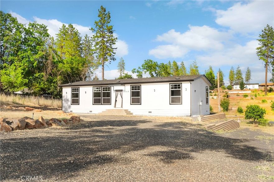 Welcome to 5568 De Sante Lane, where modern living meets small-town charm in the heart of Paradise. Built in 2022, this beautifully designed manufactured home sits on over half an acre of level land and offers nearly 1,500 square feet of thoughtfully laid-out living space. Inside, you'll find three spacious bedrooms and two full bathrooms. The kitchen flows seamlessly into the family room and connects to a formal dining area, making it ideal for everything from casual breakfasts to holiday dinners. Vinyl flooring runs throughout the home, and central heating and air conditioning keep things comfortable year-round. The separate indoor laundry room adds everyday ease, while the circular driveway with ample parking is a rare and welcome bonus.



Outside, the lot offers incredible potential. With a fully usable backyard, this property provides plenty of space and privacy for gardening, entertaining, or future projects. Located just minutes from local schools, grocery stores, and community parks, this home offers both convenience and tranquility.



If you're ready for a fresh start in a peaceful setting, this is the one.