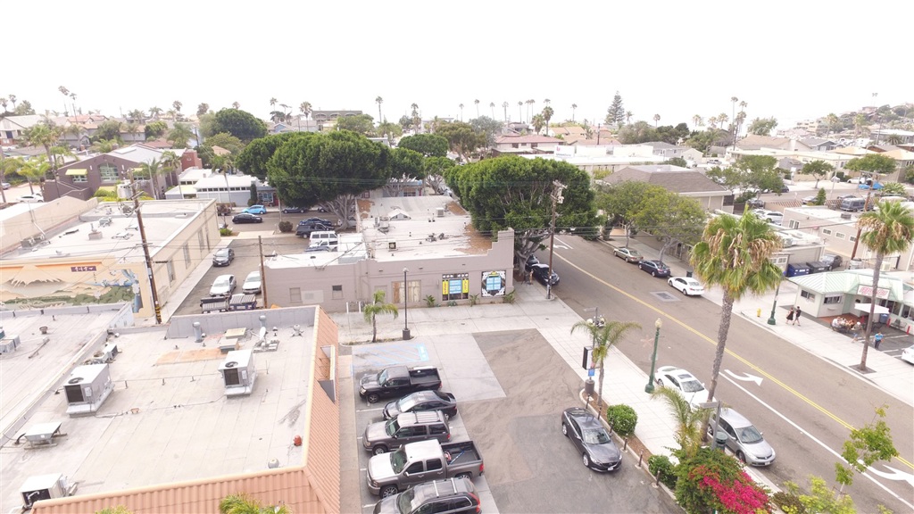 Subject to cancellation of current escrow. Rare opportunity to own a large corner lot in downtown Encinitas! There are 2 lots equalling 10,000 ft of commercial space with 100' of street frontage on each side of D and 2nd. This is a fabulous opportunity to do an update on the existing property or do a whole new development project! The rental income has been determined to be under-market value and forecasted to bring in $155,615 according to a recent appraisal.