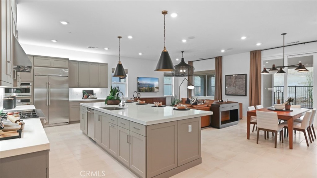 Set within a 55+ community, this single-level home features a generous open floorplan shared between the kitchen, dining room and family room, offering access to the California Room through sliding glass doors for effortless indoor-outdoor living and entertaining. The owner’s suite is situated at the back of the home, while an office and secondary bedrooms can be found off the entry.