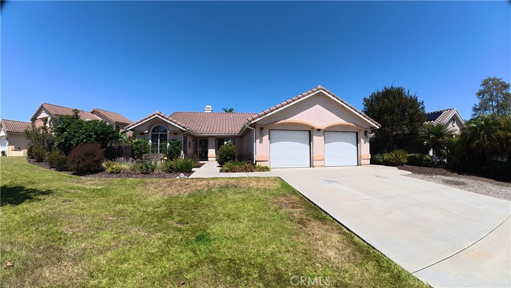 Coastal Living at Its Finest in Guajome Meadows, Oceanside!
Welcome to this beautifully maintained single-level home offering the perfect blend of comfort, functionality, and California coastal charm. Nestled in the desirable Guajome Meadows community, this spacious residence features 4 bedrooms, 2 bathrooms, and 2,010 square feet of living space on a generous 10,170 sq ft lot.
Step inside to find a modern kitchen, and a charming garden window—perfect for fresh herbs or flowers. The open-concept design seamlessly connects the kitchen to the family and dining areas, creating a warm, inviting space ideal for entertaining or casual gatherings.
Beautiful wide Plank Laminate flooring flows from the main living areas into the west wing, which includes the primary suite, two secondary bedrooms, a full hallway bathroom, and a convenient indoor laundry/utility room. The primary bedroom is a peaceful retreat with its own ensuite bath featuring a step-in shower and walk-in closet. Matching cabinetry is found in both the primary and guest bathrooms, offering cohesive and stylish finishes.
Guests are welcomed by a spacious formal living room with a cozy fireplace, creating a relaxed and elegant entry. Just off the living room is the fourth bedroom with its own private bath—perfect for guests, in-laws, or a home office.
The private backyard is low maintenance and thoughtfully designed for outdoor enjoyment. Fire up the BBQ, relax under the sun, or take advantage of the charming accessory shed—perfect for extra storage or a hobby space. Multiple types of producing fruit trees. The three-car garage adds even more functionality with built-in storage cabinets and a workbench ready for your tools and projects.
Built in 1996, this home is ideally located just minutes from local beaches, Guajome Regional Park, Access to bike path to the ocean nearby, shopping, dining, and top-rated schools—offering the ideal Oceanside lifestyle in a quiet, well-established neighborhood.
Don’t miss your chance to own this exceptional single-story home in one of Oceanside’s most sought-after communities!
