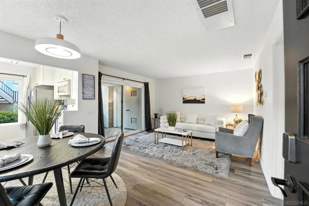 Seller will give a $5,000 closing cost credit with a full price offer!!! Beautifully updated with approximately $20k in renovations including: New Floors, New Windows/doors, New Bathroom Vanity. In Unit Laundry and a wonderful patio. You also have 1 parking space and a community pool/hot tub. The Mira Mesa Community Park across the street is doing a $43 million renovation that is bound to give great equity upside. The renovation is projected to be completed next year and will include a brand-new aquatic complex, two basketball courts (striped for pickleball), a state-of-the-art playground, skate park, and more. You are only 20 minutes from the beach while being a 5-7min walk from grocery stores and the tastiest restaurants in Mira Mesa. This is truly the Perfect Starter Home or Investment property in the Heart of San Diego.