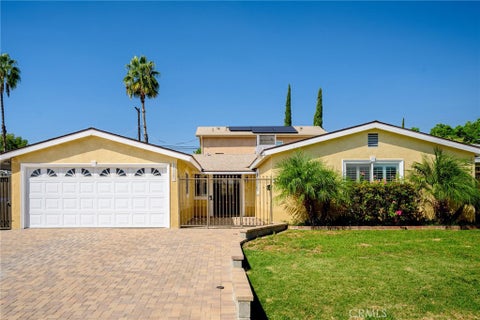 Photo of 11243 Paso Robles Avenue, Granada Hills, CA 91344 (MLS # GD26201870)