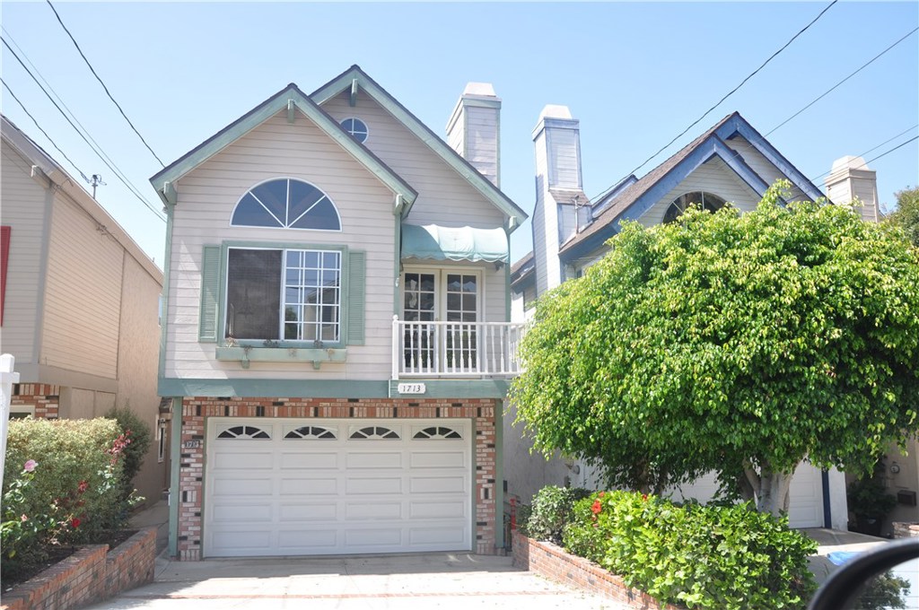 Great single family home in the Golden Triangle section of N. Redondo Beach, adjacent to Hermosa Beach, and minutes away from the beach. This North Redondo tall and skinny has the layout of two large bedrooms, one bathroom, and laundry area downstairs, and the living area with kitchen, dining, and primary bedroom and primary bathroom plus a half bath upstairs. The primary bedroom features a large walk in closet, fireplace, and beautifully remodeled primary bathroom with a separate shower, soaking tub, and double sink quartz vanity. The vaulted ceilings upstairs add great character to both the master bedroom and family room, which also has a fireplace for those chilly nights. Given the positioning of the home, a wonderful ocean cross breeze can be felt throughout the house. The kitchen opens to the dining room with a few steps down to the family room. Beautiful ardwood floors are throughout most of the house. This home is ready to go!! It's located on a great street and family friendly neighborhood with easy access onto to Artesia. With no access to Goodman from Artesia though, this makes for a pretty quiet street.