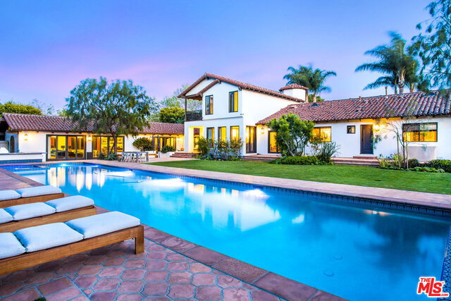 Point Dume estate with beach key. Over one flat acre of land with swimming pool and lighted tennis court. Massive yard with mature trees and hedges frame this Malibu oasis. The private gate leads to a beautiful updated home. It has been featured in various design resources and magazines. Five bedrooms, five-and-a-half bathrooms, large media room, and bright airy living room. Indoor/ outdoor lifestyle awaits at this true Point Dume estate property.