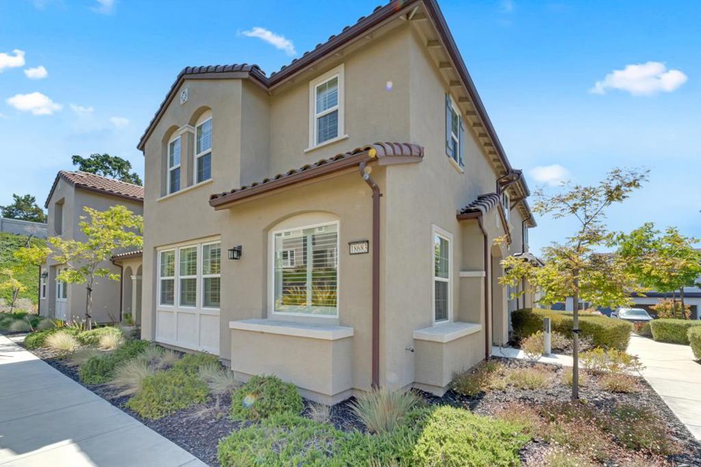Welcome to this stunning Liberty Essex model townhouse located in the desirable East Garrison community, built in 2018 and thoughtfully upgraded throughout. Offering 2,198 sq. ft. of comfortable and modern living space in combination of carpet flooring and mix types, this well-maintained home is perfectly situated near everything the Monterey Peninsula and Salinas Valley have to offer. Step inside to discover a spacious open-concept layout featuring a gourmet kitchen with a large center island ideal for entertaining. The kitchen is equipped with stainless steel appliances, granite countertops, and upgraded cabinetry, creating a sleek and functional space for any home chef. The luxurious primary suite includes carpet & tile flooring, a walk-in closet. Additional features include an upstairs loft, perfect for a home office or additional living area, and LED lighting with dimmers throughout the home. Recently upgraded with luxury Plantation Shutters and enhancements in all bathrooms throughout home. Don't miss the opportunity to own this stylish home in the desirable East Garrison Neighborhood! Schedule your tour today!