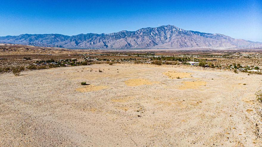 Welcome to 71690 Channel Run Road in Sky Valley situated high on a hillside with sweeping desert views that stretch for miles. Picture yourself waking up to golden sunrises, surrounded by peace and privacy, and ending the day under a canopy of brilliant night skies.This 12 acer property with water already on site,  gives you the perfect starting foundation to create your dream home. The land offers endless potential plenty of space to design, build, and truly make it your own. Whether you envision a modern desert retreat, a private sanctuary surrounded by nature, or simply a quiet escape from the busy world, this parcel invites you to bring that vision to life.