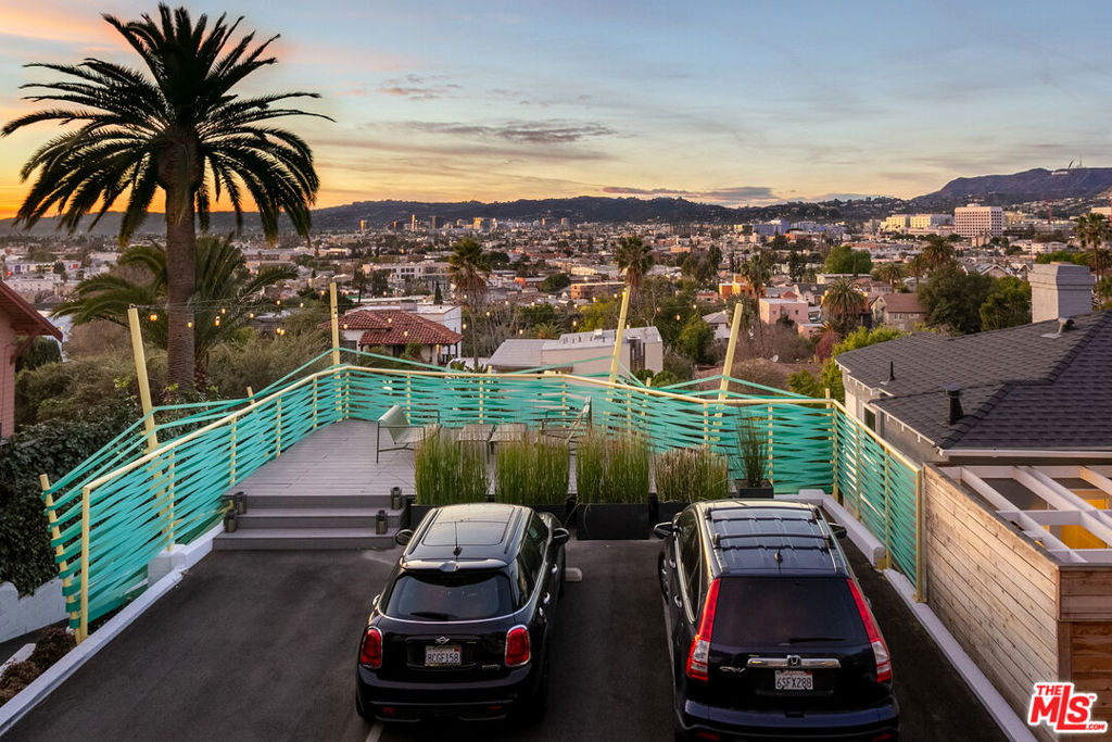 Tastefully and artistically curated Sunset Junction Silver Lake townhouses and one-story residences with backyards. Unobstructed views of Hollywood, Hollywood Hills, Hollywood Sign, Griffith Park Observatory, Capital Records all the way out to the Getty Center and everything in between. Massive, Massive Views! Never ending dramatic sunsets. Two-level townhouse style (no one above or below), private backyards, all appliances including Miele washers/dryers, Bosch dishwashers, Liebherr refrigerators, GE ranges, central HVAC, custom closets, Ring alarm home security with video doorbells, private view balconies and porches, common area installation art and much more. EV charger access. Pet friendly. Controlled access parking. Eight minutes to DTLA, ten minutes to Paramount Studios, 56 seconds to the new Erewhon and to Tartine, 32 seconds to La Colombe. Incomparable location. Truly one of a kind. ColibriLA represents perhaps the most unique, inspirational and emotional city view experiences in all of Southern California.
