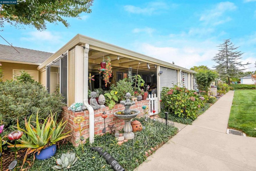 Every day feels like a getaway in this charming 2-bedroom, 1-bath end unit located in the tranquil 55+ Sunny Glen community. Thoughtfully updated, the home features a modern kitchen and bathroom, stylish vinyl plank flooring, and even a Bluetooth-enabled bathroom speaker for added comfort.  Sunny Glen offers an abundance of amenities, including a pool, clubhouse, fitness center, game room, library, bocce courts, shuffleboard, and regular community events. Relax or entertain on the spacious outdoor patio, perfect for seamless indoor-outdoor living.  All this, just minutes from nearby shops, dining, and conveniences.