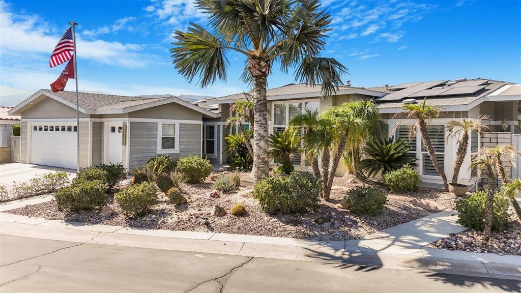 Priced To Sell! Located on a Quiet Cul-de-Sac close to the Clubhouse, this Solar home is designed for private serene living. This home is close to the Clubhouse for easy access to free golf, the main swimming pool with 2 hot tubs, an exercise room, and a full-time restaurant. This premium property has all the features that you could desire in Desert Living! Enjoy living in a 2,680 sq. ft. home on a 6,534 sq. ft. lot. Enter into the foyer to a den/bedroom with a murphy bed on your left and a beautiful formal dining room on your right. The beautiful formal Dining Table and Hutch are included. The Great room is straight ahead with an open concept. The living space features a gas fireplace, plantation shutters, and a 1/2 bathroom. The gourmet kitchen has a walk-in pantry, large eating bar and central island. The spacious Outdoor Living Area is just off the great room with a built-in BBQ and a block privacy wall. This home is an entertainers delight with lots of parking on the cul-de-sac for your guest! Going down the hall is the utility room which leads out to the triple garage with a golf cart included. At the end of the hall is the guest bathroom with a new walk-in tile shower. On the right is the amazing master suite with an updated walk-in tile shower. There is plenty of closet space and an office area! The guest bedroom is on the other side of the hallway close to the guest bathroom. Solar has been installed for low utility bills at only $179.00 per month and is assumable to the new owner!This home has to be seen to appreciate all its special features, so call for a tour or go direct.