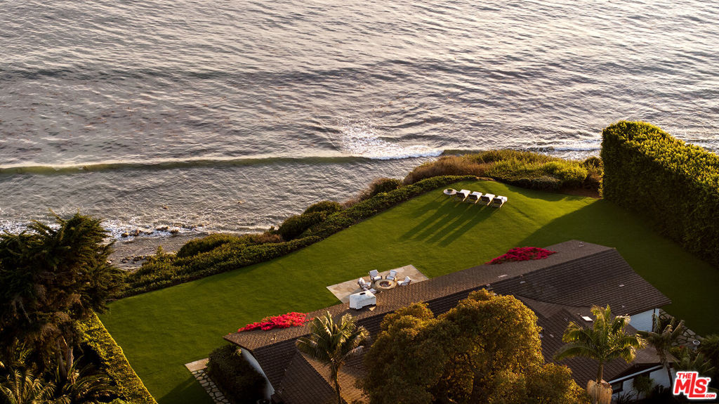 Privately set against the backdrop of the Pacific Ocean lies 4295 Marina Drive - a legacy estate that exudes the style, charm and understated elegance that define Santa Barbara coastal living. Unrivaled and unobstructed views are coupled with rare private beach access in this Hope Ranch offering. The Spanish-style adobe main house is the definition of quiet luxury - comprising 3 bedrooms, 3 bathrooms, an updated kitchen and bi-fold doors that provide optimal indoor/outdoor flow. The large primary suite is positioned towards the sea, offering staggering views of the Channel Islands. Above an oversized two-car garage, a dedicated home office captures the stunning vistas, providing an inspiring environment for productivity. The compound is further distinguished by a charming two-bedroom guest casita and an inviting one-bedroom pool house/game room, ensuring abundant space for entertaining guests and family alike. Indulge in a wealth of exceptional amenities, including a sparkling pool and spa, as well as a tennis/sports court, a delightful chicken coop, flourishing fruit trees, and exquisitely designed gardens that create an outdoor oasis. Surrounded by soaring hedges on each side, this ultra-private property will appeal to the most discerning of buyers.Situated in the esteemed Hope Ranch community, this residence grants you privileged access to Santa Barbara's finest offerings, including the exclusive Hope Ranch beach and a scenic network of walking and equestrian trails, all mere moments from the vibrant heart of the city. Iconic and timeless, this is a once in a lifetime opportunity to own a cherished piece of the California coastline and an estate for the generations.