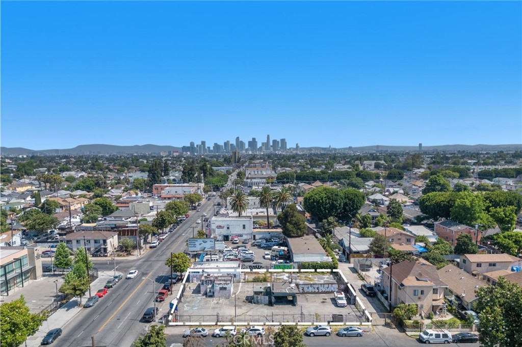 We are pleased to present this incredible opportunity to acquire a highly visible corner property in the heart of South Los Angeles—available for the first time in over five decades. This expansive 13,600 SF rectangular lot spans three contiguous parcels and is prominently positioned at the intersection of S Central Ave and 57th Street, offering outstanding exposure and consistent traffic flow. Zoned C2-1-CPIO, the property allows for versatile development options, including commercial or mixed-use projects. With alley access at the rear and potential ingress/egress on all three sides, the site layout offers excellent flexibility for future development. Formerly a Snack Shack restaurant, this site is ideal for a restaurant, drive-thru, retail space, or a ground-up redevelopment. Located just minutes from both the 110 and 10 Freeways, the property provides easy access throughout the region.