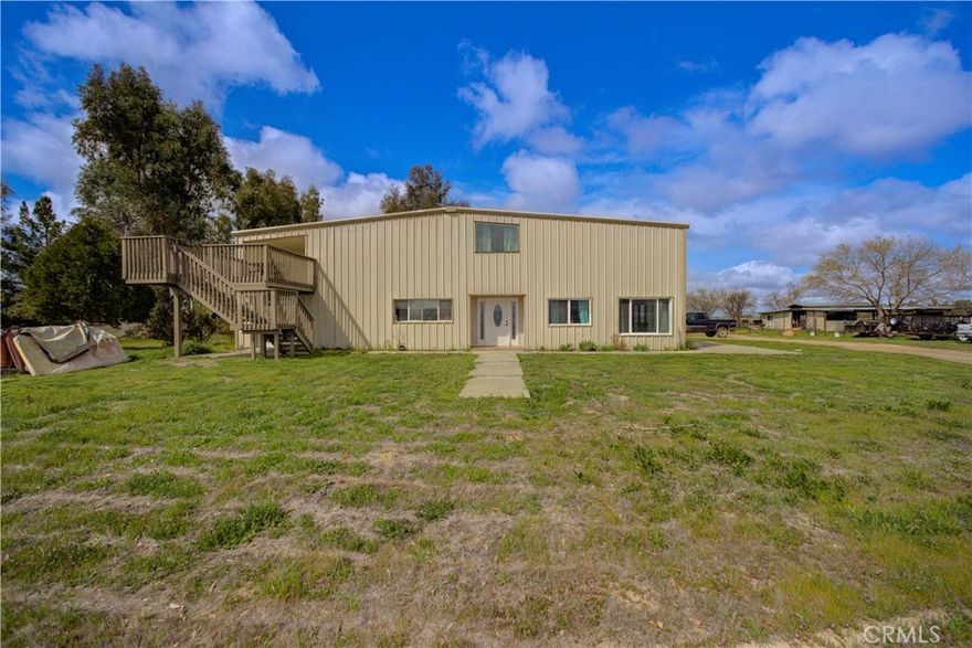 SELLER MAY BE WILLING TO DO SELLER FINANCING FOR THE RIGHT BUYER. Welcome to 8888 Carrisa Highway — a rare and remarkable 40-acre ranch estate in the heart of California’s Central Coast countryside. This property is a canvas for your vision: a sprawling retreat for those craving privacy, purpose, and room to grow.



Tucked into the rolling hills just outside Santa Margarita, this one-of-a-kind property offers a unique blend of functionality and freedom. At its heart is a thoughtfully designed barndominium-style residence, offering modern comforts within a rugged, character-rich shell. Whether you're envisioning a full-time residence, a weekend ranch, or a self-sufficient homestead, this space is ready to adapt to your lifestyle.



The home is accompanied by an oversized shop and working barn, perfect for storing equipment, housing livestock, or converting into creative space. The surrounding land is fully usable and versatile — ideal for horses, cattle, farming, vineyard projects, or simply enjoying wide-open skies and total tranquility. Existing pens, pastures, and infrastructure are already in place, saving you time and investment.



With agricultural zoning and vast acreage, the possibilities are endless. Build out a second residence, start a working ranch, explore agri-tourism ventures, or live fully off-grid. The setting offers incredible privacy, yet you're still within driving distance of Santa Margarita’s quaint downtown, San Luis Obispo amenities, and the Central Coast’s world-renowned wine country.