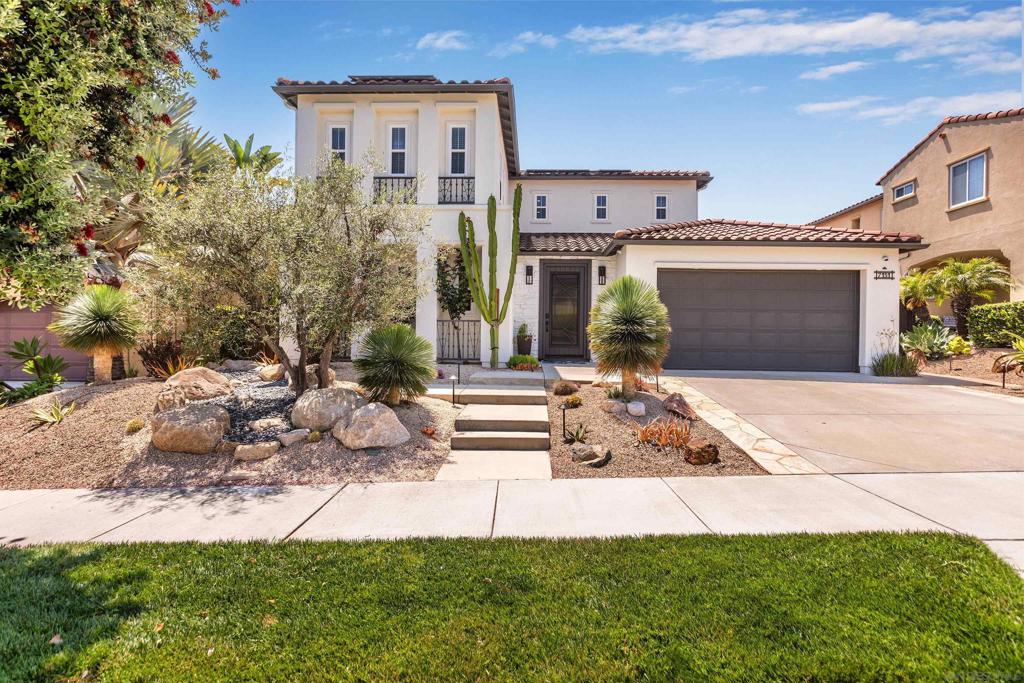 Welcome to this beautiful home in the highly sought-after community of La Costa Oaks. Thoughtfully designed and exceptionally maintained, this home lives like a single story with the spacious primary suite located on the main level. Built in 2009, it offers 4 bedrooms, 3.5 bathrooms, and a floor plan that blends comfort with modern style. From the moment you step inside, you'll notice the open-concept layout; the dining area flows right into the living room, making it a great space for gatherings. The kitchen has been updated with a large quartz island, 5-burner cooktop, and a butler’s pantry. It opens directly to the family room, where oversized glass sliders lead out to a private backyard built for entertaining. Outside, you’ll find a covered loggia, a newly built pool with water features, a spa, a firepit lounge area, and a built-in BBQ island. The yard is beautifully landscaped for privacy and has custom lighting that creates an inviting ambiance in the evenings. There's even a separate dog run on the side yard. Upstairs are three additional bedrooms and two full bathrooms—ideal for family or guests. Additional upgrades include new modern flooring, two high-efficiency A/C units, a tankless water heater with a recirculating system, and paid-for solar that covers the home, pool, and spa. The garage is finished with epoxy floors and offers plenty of storage. All of this is located close to top-rated schools, shopping, dining, beaches, and trails. This is a turn-key home you don’t want to miss.