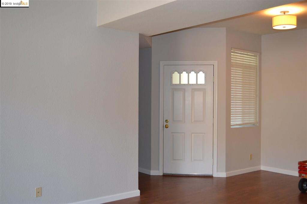 This beautifully appointed 1 master suite with large closets 1 mini master with access to patio, single level unit on 1st Floor, very private end unit with private patio and storage in desirable location. Upgraded chefs kitchen with granite counter tops and Euro style cabinets. In unit laundry room with washer and dryer. 2 dedicated parking spaces. one Carport and one uncovered. All appliances included. Amenities include 2 community pools, beach volleyball court and gym. Close to Bart, freeway access for easy commuting. Close to shopping and Dog park.