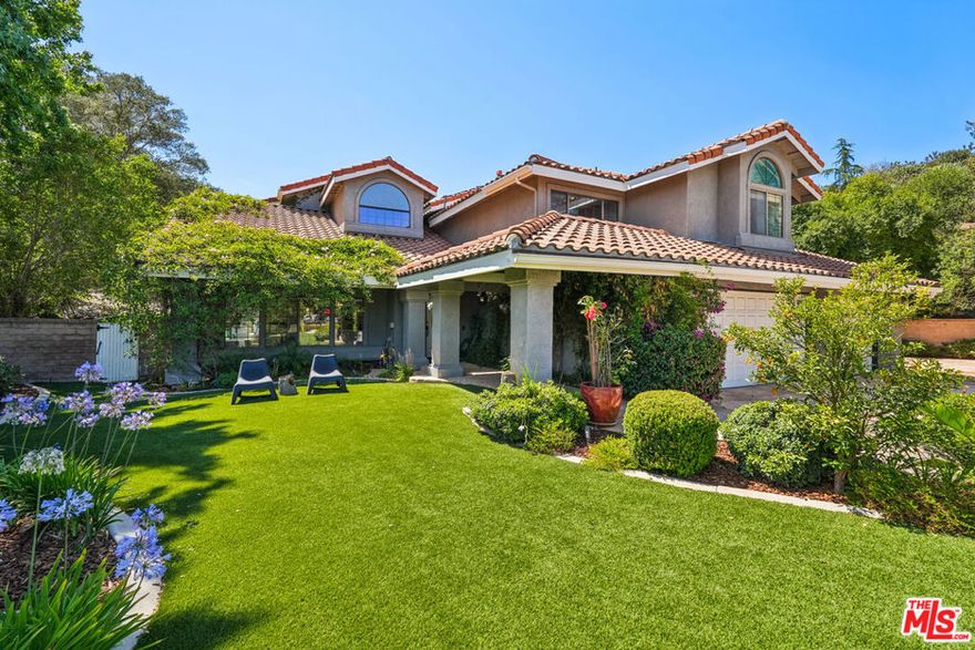 Welcome to 2084 Hopewell Court, a stunning custom-built estate nestled on nearly one acre at the end of a peaceful cul-de-sac in one of Thousand Oaks' most sought-after neighborhoods. Located on a private flag lot with a long gated driveway, ample parking, and RV access, this property offers the ultimate in privacy backing directly to Wildwood Park with breathtaking views and direct access to miles of scenic trails. Originally built with a modest footprint, the home was expanded by nearly 50% with a major custom addition including a grand new primary suite, a spacious living area, and a modern chef's kitchen. This thoughtful expansion makes it the largest home in the neighborhood, and truly one-of-a-kind in size, design, and function. Spanning approximately 4,160 square feet, the estate was crafted by premier architects and builders to combine timeless elegance with modern comfort. The resort-style backyard is a true sanctuary, featuring a Disneyland-inspired pool with rock waterfalls, spa, and a built-in outdoor kitchen and BBQ island perfect for both grand entertaining and peaceful retreats. Whether you you're enjoying quiet mornings with the sights and sounds of nature, entertaining guests in your resort-style backyard, or relaxing in your custom-designed interior, 2084 Hopewell Court offers a lifestyle that's both luxurious and rare. Space for potential ADU, buyer to verify. Come experience this unique Thousand Oaks retreat  the ultimate blend of privacy, nature, and modern living. Schedule your private showing today.