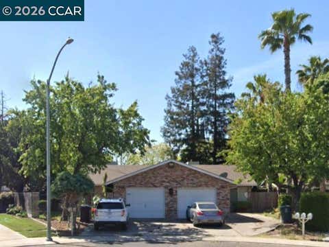 Photo of 2404 2406 Counts Ct CT, Modesto, CA 95355 (MLS # 41139524)