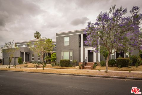 Photo of 5861 S Whitworth Dr, Los Angeles, CA 90019 (MLS # 25615851)