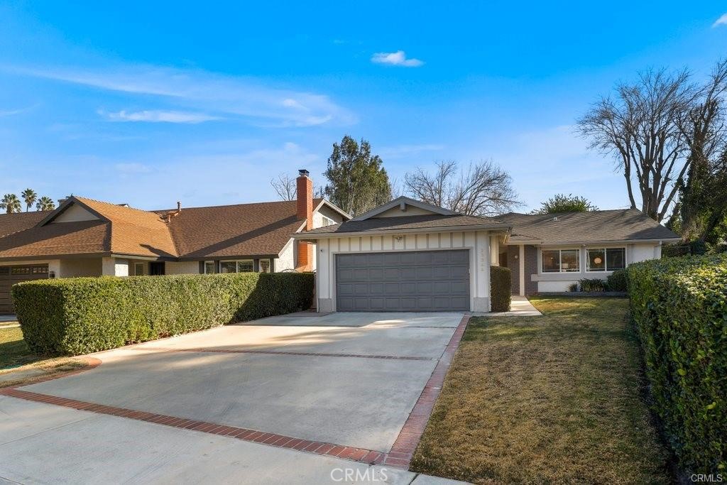 Great Single Story Home Nestled in Desirable Happy Valley! This charming house features a versatile floor plan with large backyard and a great covered patio. Enter into an open concept family room and kitchen with abundant natural light, perfect for entainting. The spacious, updated kitchen boasts custom tile floor, granite countertops and stainless steel appliances, and a skylight. In addition to the counter bar seating, there is ample space for a large dining table. Adjacent to the kitchen is the family room, with a fireplace, vaulted ceilings, and a slider to the fabulous covered patio for relaxation and outdoor gathering. Throughout the home, you’ll find real hardwood floors and new custom European tile! The primary suite includes a walk-in closet, en suite bath, and large 10’x10’ bonus space with additional closet too. This home also features a massive addition that boosts another den and bedroom or could be an in-law suite. With french doors that open wide to the covered patio, as well as custom cabinets and desk, this versatile space also includes a skylight and large windows for incredible natural light. Two more spacious bedrooms share a hallway bathroom that has been beautifully remodeled with custom tile, a deep soaking tub and modern vanity with marble countertop! This lovely family home has undergone extensive updates, including freshly painted interior and exterior, 240V outlet for an electric vehicle in the garage, new Wi-Fi connected garage door opener, a brand new HVAC and ductwork, and new water pressure regulator and whole house fan. This Fabulous home has extensive storage space, SOLAR, No HOA and No Mello Roos! This is a must see right away!