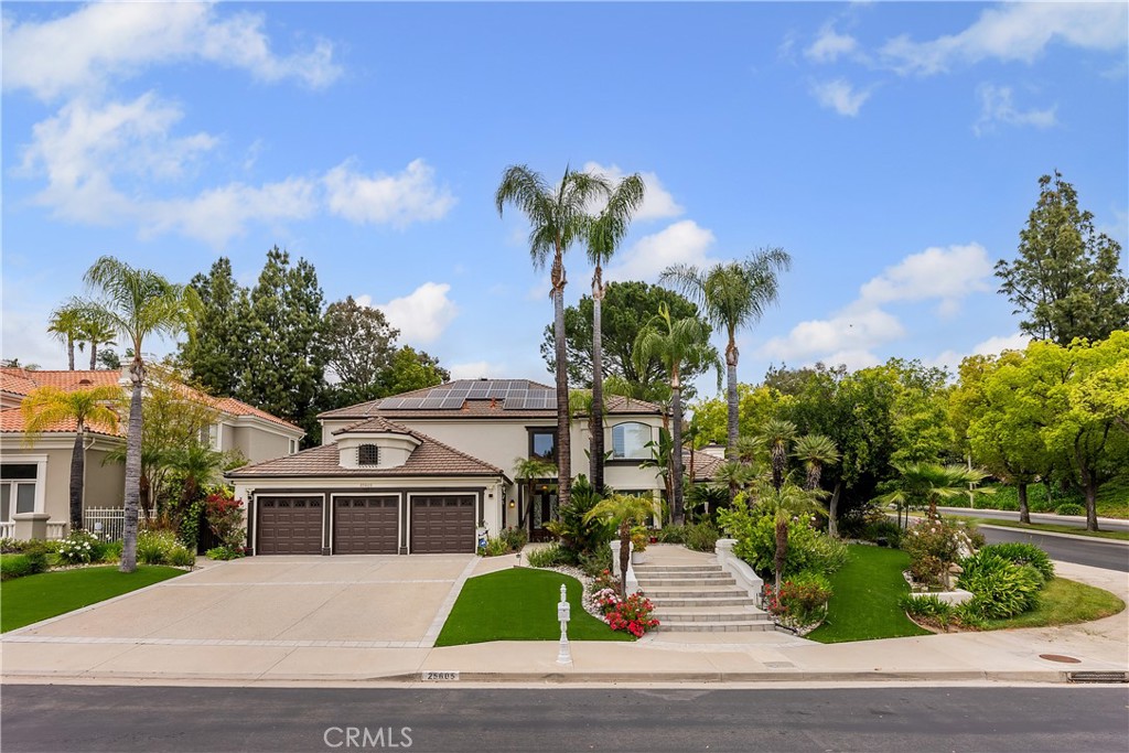 Welcome to 25605 Queenscliff, the one you've been waiting for! Located in the exclusive 24/7 guard-gated Calabasas community of Mountain View Estates, this home has it all. With 4,778 sq. ft. of living space, it features five bedrooms, including an oversized primary suite, and 4.5 bathrooms. The open-concept design is perfect for entertaining, boasting a chef's kitchen and formal dining area. Outside, enjoy an entertainer's dream yard with a pool, a large terrace and artificial turf. In addition, the home features paid off solar panels. Come and check out this amazing location in a family- friendly community, this home is a must see!