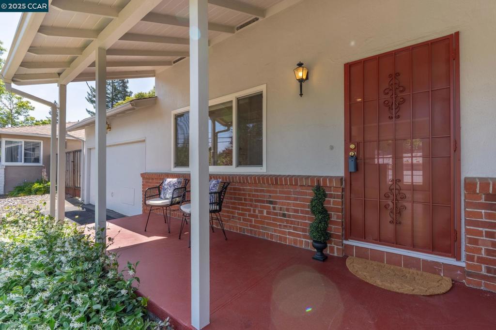 Welcome home to this inviting 3 bedroom, 2 bath home in Lafayette’s highly sought after Burton Valley neighborhood. Set on a quiet, family friendly street. Step into the bright living room featuring a brick fireplace, perfect for cozy evenings. The recently refinished hardwood floors and fresh interior paint provide a clean, updated feel throughout. French doors off the kitchen open directly to the sunny backyard, creating effortless indoor/outdoor flow for entertaining or everyday relaxation. This home includes a spacious two car garage with built-in shelving for ample storage. With top rated schools, a prime location.