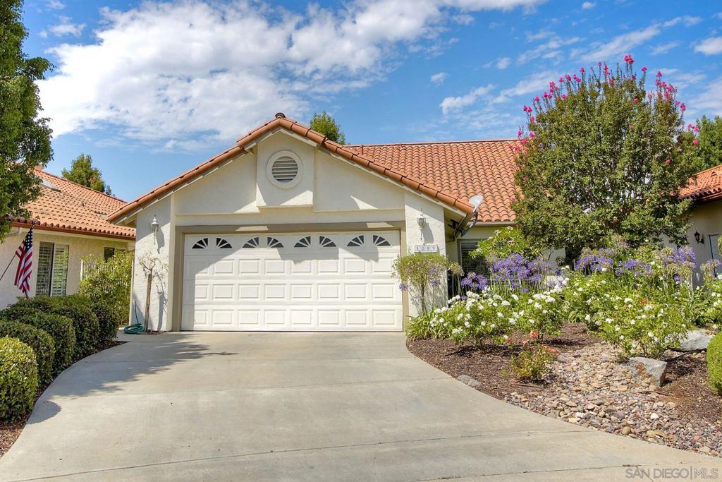 Resort-Style Living with Spectacular Mountain and Sunset Views in East Ridge, a 55+ Gated Community where residents enjoy an exceptional array of amenities including walking trails, community pool, club house, tennis and pickleball courts, a community garden, putting green, dog park and RV parking provided by HOA at no additional cost. This beautifully landscaped 3 bed, 2.5 bath home offers easy single-story living with the living areas and primary bedroom ensuite located on the main level. Enjoy vaulted ceilings, plantation shutters, a spacious covered patio and breathtaking views right from your property. Recent updates include a newer HVAC system (2024), updated plumbing, newer fiberglass patio cover and an updated roof. Set in the heart of Fallbrook—known as the “Avocado Capital of the World”—you’ll love being close to charming local wineries, farms, golf courses, and fine dining. The annual Avocado Festival and welcoming small-town atmosphere add even more to the appeal.