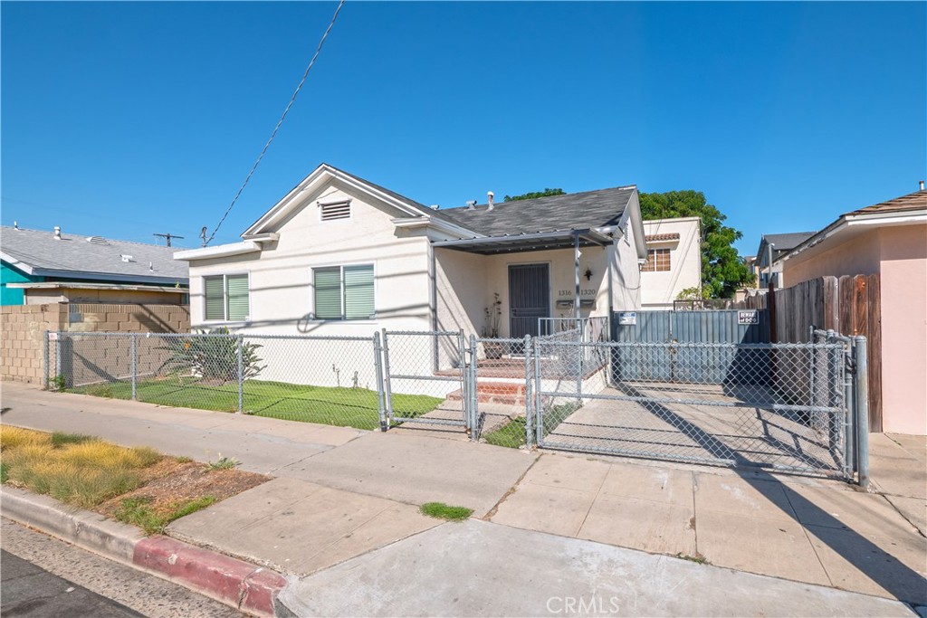 Welcome to 1316 S Grand Avenue, a beautifully updated duplex in the heart of San Pedro. Delivered completely vacant at close of escrow, this property is the perfect opportunity for both investors and owner-occupants seeking immediate potential. Each unit features 2 bedrooms and 1 bathroom, with its own garage, and the property has undergone several recent upgrades including fresh interior and exterior paint, new flooring, updated kitchens and baths, modern fixtures, a redone outdoor patio, and a newly covered stair railing that enhances both safety and curb appeal. With a gross annual rent potential of $63,600, the property offers a strong pro forma return, boasting a GRM of 14.54 and an approximate CAP Rate of 5.8% at the $924,900 asking price. The vacancy allows investors to set market rents immediately, while owner-occupants can take advantage of the opportunity to live in one unit while renting out the other for strong supplemental income. Located in Central San Pedro, this duplex offers convenient access to the LA Waterfront, freeways, schools, dining, and shopping. With its turnkey condition, income-producing potential, and prime location, 1316 S Grand Avenue is a rare opportunity in one of Southern California’s most exciting coastal markets. Schedule your private tour today and see all that this San Pedro property has to offer.