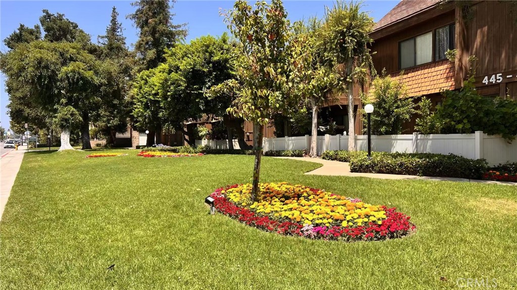 Welcome to this beautifully kept 2-bedroom, 2.5-bath townhouse located in a quiet, private complex within the highly sought-after Arcadia Unified School District. This bright and airy home features wood and laminate flooring throughout, a spacious living room, and an open dining area that overlooks a private front patio—perfect for relaxing or entertaining. Upstairs, you'll find a generous master suite with high beamed ceilings and a huge closet with three sliding doors. A conveniently located laundry room is situated in the upstairs hallway. Additional highlights include a detached two-car garage, access to a sparkling community pool, and an unbeatable location just minutes from Santa Anita Mall, golf courses, the Santa Anita Race Track, supermarkets, restaurants, and public transportation. Walk to Arcadia High School! Don't miss this opportunity to live in one of Arcadia’s most convenient and desirable neighborhoods!