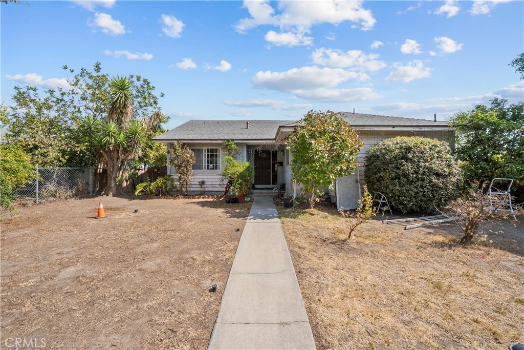 First time on the market in over 33 years! This Sylmar corner-lot property offers 4 bedrooms and 3 bathrooms, including a unique 4th bedroom with its own private entry and full bath—ideal for extended family, guests, or a private workspace. The home features a large driveway with RV and alley access, a detached garage, which will make a perfect ADU, and a covered patio that adds to the outdoor living potential. There is a unique step down to the detached garage which adds a perfect touch to the possibilities of a second home! The property will need updates and repairs, which presents an excellent opportunity for investors, DIY buyers and all looking to create a home tailored to their own style and vision. With its spacious lot and versatile layout, this residence is ready for its next chapter. Close to all major freeways, shops and so much more!