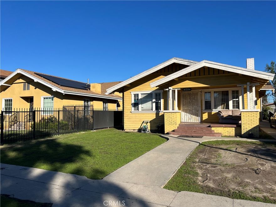 Set on a quiet wide street in Vermont Square area, this inviting duplex offers an excellent 
investment opportunity just minutes from Exposition Park, BMO Stadium, and USC. The 
property features 2 units with spacious 4-bedroom, 2-bathroom in the front unit(2119Sqft) and 2-bedroom 1 bathroom in the back unit (1000Sqft), with a total of 4 car garage making it ideal for renters or an owner-occupant. The front unit is tenant-occupied on convenient month-to-month 
leases and the back two story unit is owner occupied, ensuring immediate rental income with flexibility for future plans. The property sits 
on a generous 6,407-square-foot lot, providing ample outdoor space for gardening, 
entertaining, or future expansion. Located in a thriving, high-demand neighborhood, this 
property promises long-term growth potential. Vermont Square continues to attract a 
diverse tenant base, from students to professionals, thanks to its proximity to USC, 
museums, cafes, shopping, and vibrant dining options. The duplex's charming exterior 
features a shaded front porch, adding curb appeal and a welcoming touch. Whether you're 
looking to expand your rental portfolio or secure a future home with income potential, this 
property is a standout choice.