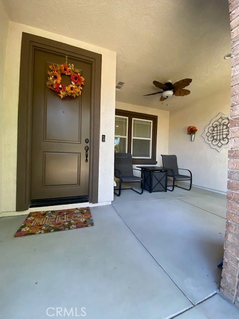 Make front door entry thru covered patio with neighborhood view beneath the ceiling fan. Once thru the door there is a downstairs bedroom/office to the left with a 3/4 bath nearby. Step further to view the nicely decorated kitchen, dining and family room. There is extra storage behind the swiveling bookcase in the family room. There is a nice view of the backyard from most of the downstairs. Access to the backyard is from either a sliding glass or the swinging door. This creates a free flow perfect for entertaining. The backyard has an aluminum patio cover with ceiling fan, stone textured stamped cement and artificial turf for easy maintenance. There is a 2 car garage on the south side of the backyard.
Upstairs are the main bedroom, two secondary bedrooms, 2 full bathrooms along with a laundry room. All show clean and nicely decorated. The master bedroom has a view of the backyard while the secondary bedrooms have a street view. Please note the very large closet in the main bedroom suite.