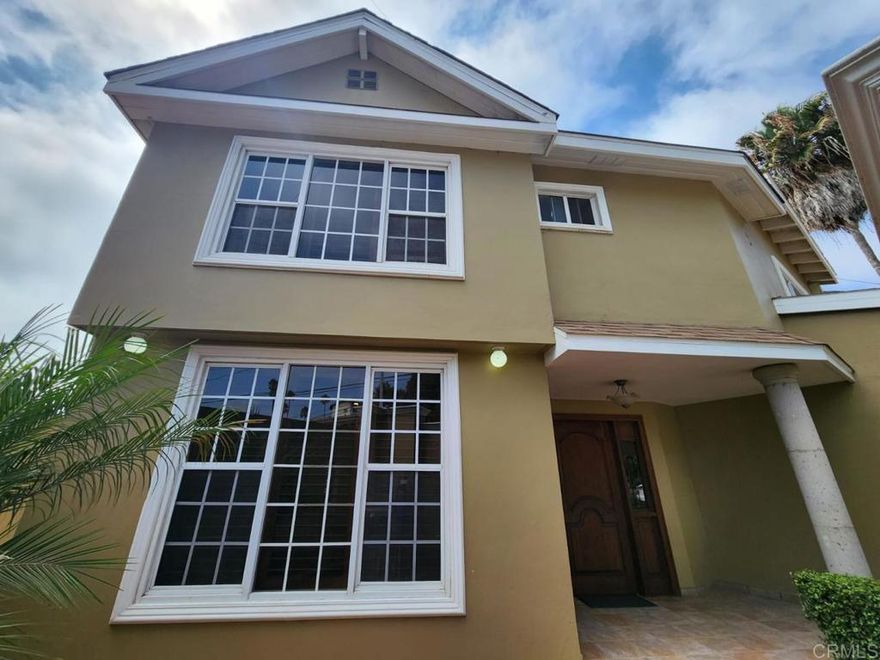 Magnificent house for sale, located in the most prestigious neighborhood in the city of Ensenada. Privada San Marino offers the perfect location and community, where residents are long-established families who have lived in the city for generations. Upon entering this beautiful residence, we are greeted by its wooden floors, which exude warmth and harmony throughout all its spaces, combined with its excellent condition and unique design that blends conservative and modern styles. The first floor consists of a foyer, a spacious living room with a fireplace, a dining room, a half bathroom, and a fully equipped kitchen with a breakfast nook, which adjoins the terrace and garden of the house. Adjacent to the kitchen is the indoor laundry area with cabinets, a service patio, and storage for gardening tools and equipment. The electric garage is spacious and can accommodate two large cars. The second floor consists of three bedrooms, all with large closets. Two of them share a full bathroom. The master bedroom has a walk-in closet and a full bathroom. Additionally, there is a study with an attic and/or TV room, office, or it could even be a fourth bedroom, as it has a full bathroom. Come and see this beautiful property; we are sure it will meet all your expectations.  MATERIALS AND EQUIPMENT: Wooden blinds in bedrooms, TV room, study, living room, and dining room. Curtains in kitchen, breakfast nook, and laundry room. Maple wood staircase with tile fronts. Stainless steel stair railing. Complete kitchen furniture with Corian countertops and wooden breakfast table. Windows, interior doors, and lower part of walls with mahogany wood moldings. Mahogany front door. Mini-splits in the four bedrooms on the second floor (for cooling or heating). Alarm system with motion sensors. Reverse osmosis water purification system. Approximately 6,000-liter water tank with automatic pump system and pressure regulator. New stationary gas tank. Water heater in working order. Ceiling lights in first and second floor hallways, stairways, study, and master bedroom dressing room. Fan with light in TV room and terrace.  Within walking distance are the Lucerna Hotel and Restaurant, Coral y Marina Hotel and Restaurant, Flor de Calabaza Restaurant, Transpenisular Brewery and Restaurant, Cava Cetto, Soriana Market, among others. Renowned schools of all academic levels are located nearby, including Cetys University, UABC, CICESSE, UNAM, CALP, ANAHUAC, and Colegio México. Additionally, it is located behind the internationally renowned CLINICA HINNO, 200 meters from the soon-to-be-inaugurated EPYONE MEDICAL TOWER. VELMAR Hospital and CARDIOMED are only 10 minutes away. Just 10 minutes from downtown Ensenada, with immediate access to the Tijuana-Ensenada Scenic Highway, 25 minutes from the Guadalupe Valley, and just one hour from the US border. Living in this wonderful port city has become quite an experience, given its cuisine, hospitality, and quality of life.