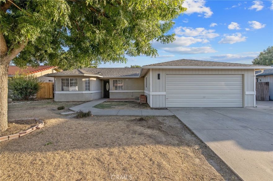 Tucked away in a desirable Hanford neighborhood, this charming single-level home offers comfort, privacy, and convenience. Featuring 3 bedrooms and 2 baths across approximately 1,295 sq. ft., the open layout provides a natural flow between living, dining, and outdoor spaces. A cozy fireplace and new flooring bring warmth throughout. Situated on a 6,400+ sq. ft. lot, the backyard pool makes entertaining easy, while the two-car garage adds storage and potential for expansion. A great opportunity to add value and make this home your own!