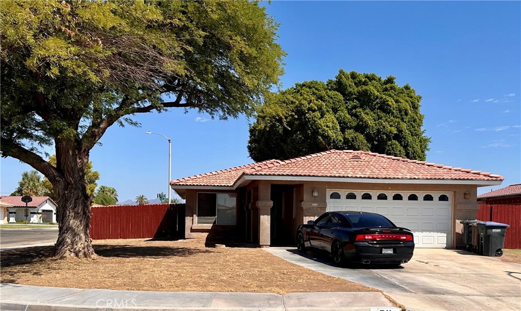 Great value in this 3 bedroom 2 bath home. Large fenced corner lot. Beautiful kitchen and bathroom remodels. Interior is very nice. French doors off of the primary and kitchen eating area. Large family room. Attached 2car garage with laundry and auto garage door opener. Spacious large lot ready for your landscape design. Storage shed in rear yard.