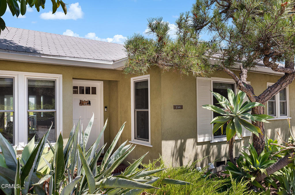 Enjoy breathtaking, panoramic views of the San Gabriel Mountains in this spacious split-level home. Located in the desirable San Rafael Hills neighborhood of Pasadena, this is the ideal location for peace and quiet while being close to local amenities, including Little Flower, Stoney Point, San Rafael Library, and San Rafael Park. With 2,275 total square feet (as measured), this traditional-style home offers both comfort and versatility.The formal living room, complete with a decorative fireplace and built-in bookshelves, is the perfect spot to take in the scenery. Sliding doors lead to an expansive screened-in porch with access to a deck, the perfect spot to take in the views across Pasadena.The updated eat-in kitchen has ample cabinet space, stainless steel appliances, and access to the porch plus stairs to the back yard.This 4-bedroom, 3-bathroom home features a smart floor plan with three bedrooms and a hall bath upstairs, while the lower level offers a private bedroom suite with a remodeled 3/4 bath, an additional room with a closet, a laundry room, and a new 3/4 bath. The home's original hardwood floors upstairs and new hardwood floors downstairs provide a warm, inviting atmosphere.Additional highlights include central air and heat, an attached garage with direct entry perfect for a workshop and extra storage, a two-car carport with car charger, a large paver-stone driveway and patio for entertaining, and a flat yard area with a garden.Existing furniture can be included. A one-year lease term is preferred. Pets are welcome upon review with a $500 deposit. Tenant is responsible for utilities.