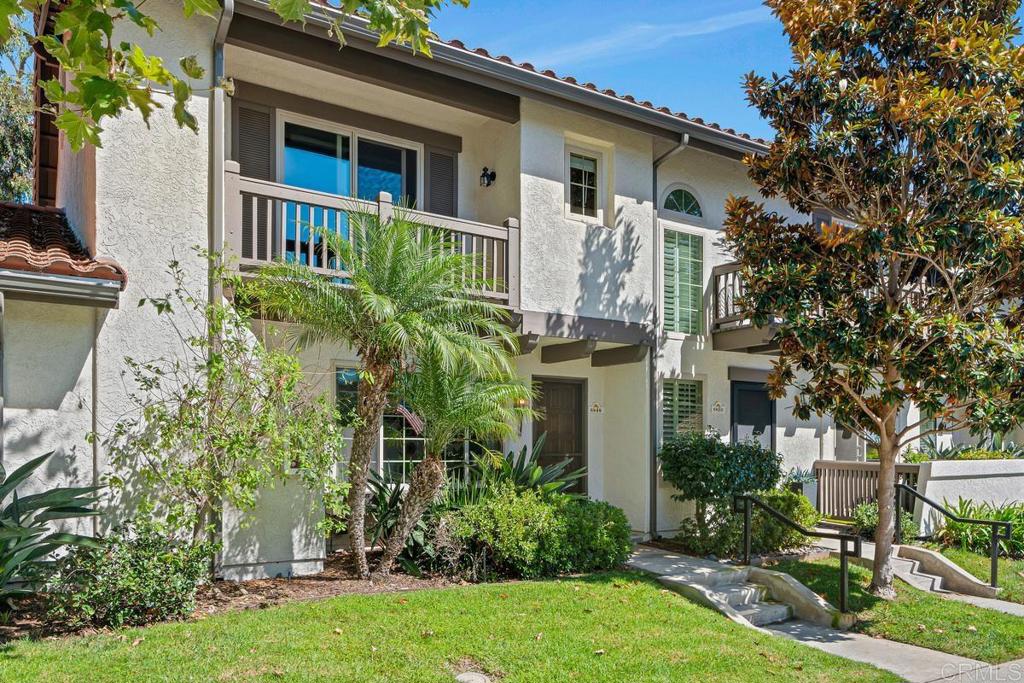 Picture-perfect townhome in Carlsbad’s Las Playas community, offering breezy coastal charm and sunset views. This west-facing retreat, tucked away from traffic, boasts a remodeled kitchen with shaker cabinetry, stainless steel appliances, gas range, and microwave, plus three updated bathrooms and light oak LVP flooring throughout. Spacious primary suite with walk-in closet and modern bath with walk-in shower. Cozy living room with fireplace and updated ceiling fan. Large secondary bedrooms. Private patio yard & detached garage. Enjoy community pool, tennis and hot tub. Walk to Pacific Rim Elementary, Poinsettia Park, Batiquitos trails, beaches, and more.