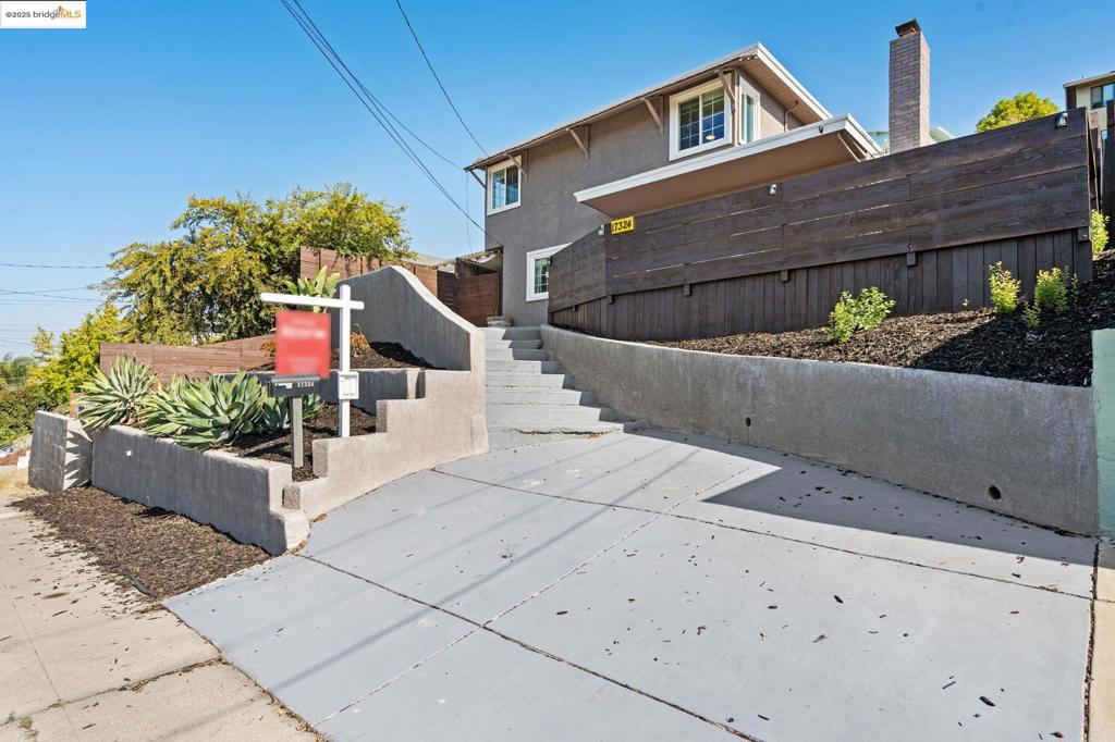 This stylishly updated 4-bedroom, 2-bath home blends comfort, functionality, and fresh modern design. Inside, you’ll find an inviting layout with gleaming hardwood floors, a contemporary kitchen with sleek finishes and stainless steel appliances, and two beautifully remodeled bathrooms. Large windows bring in natural light and hillside views, while the spacious backyard offers room to relax, entertain, or garden. A large storage shed with windows adds extra versatility—perfect for a workshop, studio, or bonus storage. With thoughtful updates throughout and a layout that lives large, this home is move-in ready and full of charm. Conveniently located near schools, parks, shopping, dining, and commute routes, it checks all the boxes.