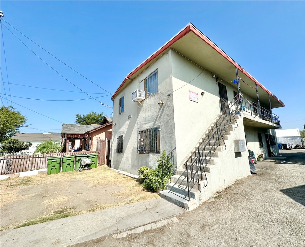 Located just minutes from Crypto.com Arena (formerly Staples Center), Downtown Los Angeles, and USC, this well-maintained fourplex presents a strong investment with excellent growth potential. Each of the four units offers 2 bedrooms, 1 bathroom, a kitchen, and a dining area. Most of the units have been renovated with laminate flooring and fresh paint. The property features a NEW ROOF, NEW WATER HEATERS, refurbished stairs and deck, and ample on-site parking for seven vehicles plus street parking. The property encompasses 2,438 sq. ft. of living space on a 5,334 sq. ft. lot. Current monthly rental income is $5,536 ($66,432 annually), with the ability to raise rents up to 3% annually and additional upside through future renovations or ADU development potential. This is an excellent opportunity for both seasoned investors and first-time buyers looking to grow their portfolio in one of Los Angeles’ most dynamic rental markets. Strong cash flow and future growth make this a MUST-SEE FOR INVESTORS!