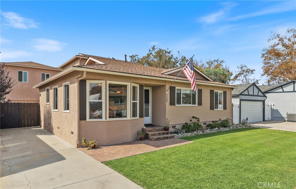 Discover warmth and comfort with this beautifully upgraded pool home in this highly desirable Lakewood neighborhood! With 5 bedrooms, 3.5 baths, 2,175 sqft AND an additional 504 sqft bonus room above the detached garage, all the needs for your family are fulfilled! The heart of the home lies in the freshly remodeled kitchen, featuring granite counters, travertine-stone-like tile backsplash, sleek solid wood shaker cabinets and recessed lighting. A thoughtfully opened layout creates an inviting atmosphere for both cooking and dining. The expansive family room boasts a cozy fireplace and has direct access into your backyard with the covered patio, pool and spa, which is perfect for gatherings. The downstairs primary bedroom comes complete with a large walk-in closet and bathroom. Additionally, there are two more bedrooms downstairs along with a full hall bathroom. Upstairs you will find two additional spacious bedrooms and another 3/4 bathroom. This home has 3 year new central air conditioning, 50 gallon water heater, dual pane windows and sliding glass door. Enjoy the tranquility of a heated saltwater PebbleTec pool and spa accented by custom hardscaping, including a waterfall feature, and with the added convenience of an outdoor shower. The covered patio and grassy area enhance the outdoor living experience with plenty of space to gather and entertain. The detached, extra-long, 2 car garage (28' x 18') houses the washer & dryer plus a half bathroom. The HUGE 28' x 18' bonus room above the garage offers so many options including an office, gym, or entertainment space. The home is situated close to schools, walking trails, Rynerson and Heartwell Parks, Heartwell Golf Course, Cerritos Mall and Long Beach Towne Center. Easy access to the 605 Freeway simplifies commuting. Don’t miss out on this amazing opportunity!