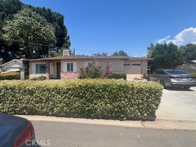 If you are looking for an older home with charm and character this one is for you, There has been some updating and room additions added very roomy. large Livingroom and a family room nicely landscaped in front, the rear yard has a covered patio and out building come look for your self.