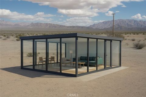 Photo of 85776 Sunrise Way, 29 Palms, CA 92277 (MLS # JT25272794)