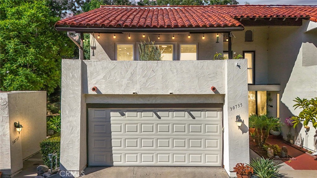 Welcome to 30735 Calle Chueca—This gorgeous end unit home is nestled in the highly sought after Casitas Capistrano community. Thoughtfully remodeled with timeless style and endless modern comfort, this 2 bedroom, 2 bathroom home blends casual luxury with effortless livability—just moments from the heartbeat of downtown San Juan Capistrano.
Upon entry, you are greeted with an open floor plan that is light and bright. The living room flows into a gourmet, updated kitchen outfitted with quartz countertops, white shaker cabinetry, stainless steel appliances, and a peninsula island with bar seating—perfect for everyday meals or entertaining.
Two spacious bedrooms await you upstairs including a serene primary retreat with a patio balcony that is perfect for your morning coffee or weekend lounging. A custom-built barn door opens to a freshly renovated spa-like bathroom, featuring a frameless walk-in shower with designer tile, modern fixtures, and a finishes—creating an elevated living experience.
Additional property features include a designer closet organization system inside the bedrooms, a direct-access two-car garage with ample storage space, custom built wine rack and bar, and a private, landscaped backyard with outdoor shower. Residents also enjoy access to a pool and picnic areas. The home is minutes from JSerra High School, within walking distance to San Juan Capistrano’s vibrant downtown and just a short ride to Dana Point Harbor, coastal trails, and beaches.
30735 Calle Chueca delivers turnkey comfort, a flair of Spanish-modern elegance, with a twist of coastal charm. Don’t miss out on this rare opportunity!