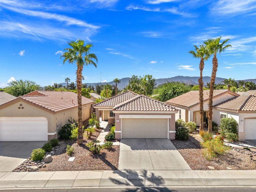 55+ Sun City Palm Desert--The ''Best Bang for your Buck'' active retirement community in the desert!!! This popular Newport model has great curb appeal and is ideally located near the Newcastle gate close to Starbucks and Stater Bros and within walking distance to the private pool/spa and BBQ area. This light and bright home features 2 bedrooms and 2 bathrooms, brand NEW desert-toned carpet, custom tile, plantation shutters, and HVAC in 2019. The spacious kitchen has newer appliances and a cozy breakfast nook. The great room has a slider to the rear patio and provides abundant light. The master suite offers a quiet retreat with bay window and fan w/light, bath has dual vanity, large stall shower, and walk in closet. The guest bedroom is on the opposite side of the home for maximum privacy and has a  full bath with shower/tub combo. The 2 car garage is extended and spacious.The covered patio is extended, south facing and has lovely desert landscaping and flowers and is perfect for relaxing with a good book or entertaining for the holidays. Come enjoy all the wonderful amenities Sun City has to offer....3 outdoor pools and one indoor pool, state-of-the-art fitness center, 2 golf courses, 2 restaurants, post office, a wide array of clubs etc...'Buy Where you Love to Play...Sun City Palm Desert!'