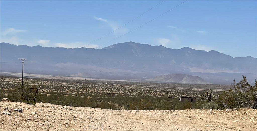 Discover the freedom and possibilities that come with owning this spacious 2.5-acre residential lot in Adelanto. With wide-open desert views, this flat parcel offers the perfect opportunity to create your own private getaway, RV space, recreational oasis, custom home, or long-term investment. Bring your toys and adventurous spirit. Whether you're looking to build now or hold for the future, this property combines rural charm with real potential.