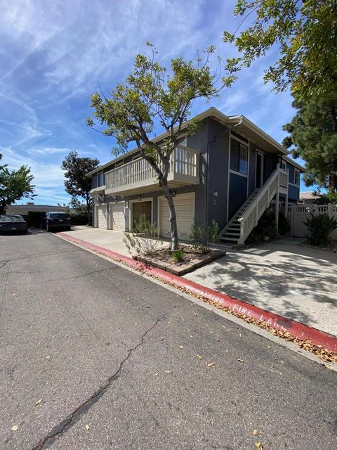 Photo of 8834 Tamberly Ln Ln #D, Santee, CA 92071 (MLS # 260001363SD)