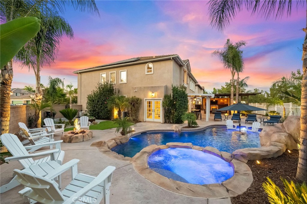 Welcome to 31917 Camino Rabago, an executive 5-bedroom, 4.5-bathroom, 3,842 sq ft masterpiece in Temecula’s prestigious Paseo Del Sol, fully remodeled with a state-of-the-art smart home system and paid-off solar for energy efficiency. This home features an updated kitchen with modern features, including a built-in refrigerator, and a luxurious backyard oasis with a built-in cabana, firepit, saltwater pool, and equipped outdoor kitchen—perfect for entertaining. Enjoy resort-style community amenities, including multiple playgrounds, sports courts, a clubhouse, private swimming pools, lighted walking paths, picnic areas, and lush greenbelts. With no neighbors on one side or behind, savor spectacular mountain and city light views. Ideally located near Temecula Parkway shops, with easy I-15 access and minutes from renowned wineries, golf courses, and Pechanga Casino, this home is zoned for the top-notch Temecula School District—your dream retreat awaits!