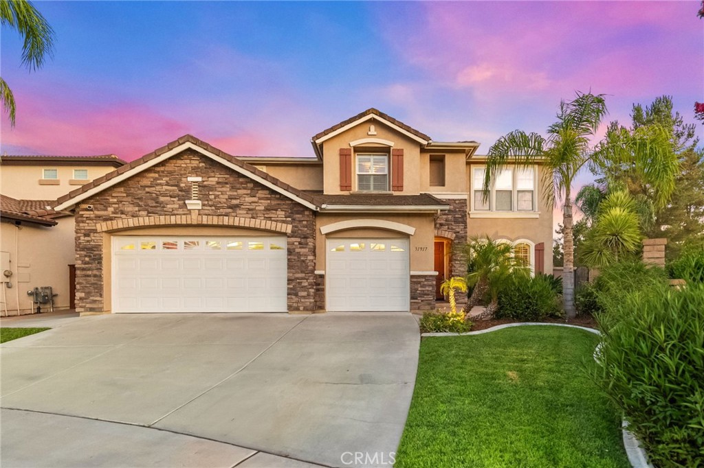Welcome to 31917 Camino Rabago, an executive 5-bedroom, 4.5-bathroom, 3,842 sq ft masterpiece in Temecula’s prestigious Paseo Del Sol, fully remodeled with a state-of-the-art smart home system and paid-off solar for energy efficiency. This home features an updated kitchen with modern features, including a built-in refrigerator, and a luxurious backyard oasis with a built-in cabana, firepit, saltwater pool, and equipped outdoor kitchen—perfect for entertaining. Enjoy resort-style community amenities, including multiple playgrounds, sports courts, a clubhouse, private swimming pools, lighted walking paths, picnic areas, and lush greenbelts. With no neighbors on one side or behind, savor spectacular mountain and city light views. Ideally located near Temecula Parkway shops, with easy I-15 access and minutes from renowned wineries, golf courses, and Pechanga Casino, this home is zoned for the top-notch Temecula School District—your dream retreat awaits!