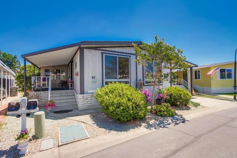 NO PRPOPERTY TAX. RENT CONTROL. 1978. Space rent $689 month. 2br 2b with large Calif Room that could be workshop, craftroom, art studio, or 3rd bedroom. Lovely move-in ready. New Composition roof installed 2016. Furnace and water heater replaced about 5 years ago. This home is open and spacious with easy flow throughout. Extra large laundry room; both washer/dryer stay with the home as does all the appliances. Front porch faces west to enjoy the ocean breezes. There is also a side back patio and backyard if you enjoy outdoor living. Delightful front porch. There is exit/entrance the front porch to go to the backyard garden area. Very quiet and peaceful. This home has a sturdy ramp on the carport side but it can be removed if you dont need it. 2 small pets welcome. Park is level and easy to walk around and ride bikes. LOTS of FUN Activities and great neighborhood camaraderie. 2 pools. 2 clubhouses. 2 kitchens. Parties. Potlucks. Card rooms. Billiards. Crafts. Pickleball, Exercise Classes. Karaoke. Just outside the entrance of the park are grocery stores, banks, Starbucks, lots of restaurants, Walgreens, Post Office, library, Oceanside Police Station. Located about 4 miles from the ocean, harbor, charming pier, farmers markets, beach walks, street fairs, theaters, etc.